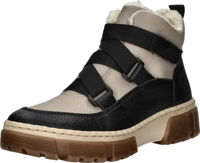 A single beige and black boot with black straps and a brown sole is shown against a white background.