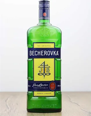 A bottle of Becherovka herbal liqueur is shown against a plain background.