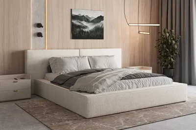 A bedroom scene with a bed, nightstand, and artwork.