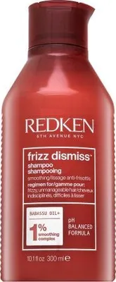 A red bottle of Redken Frizz Dismiss Shampoo.