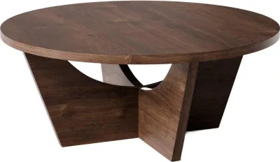 A round, dark wood coffee table with a unique base.