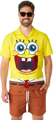 A man wearing a SpongeBob SquarePants themed shirt and shorts.