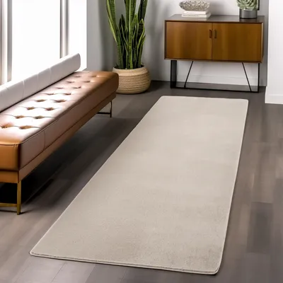 Produktbild von Waschbarer Teppich in Creme, kurzflorig, rutschfest und weich, modernes, einfarbiges Design für Wohnzimmer und Schlafzimmer 160 x 220 cm