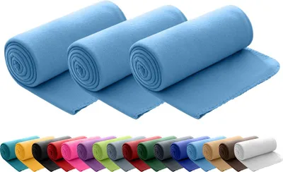 Three rolled-up blue fleece blankets are shown in the foreground, with a row of colorful rolled-up blankets below.