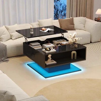 A modern living room scene featuring a black high-gloss coffee table with LED lighting and storage, placed in front of a sectional sofa.