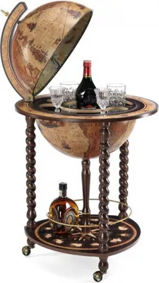 A globe bar with bottles and glasses inside.