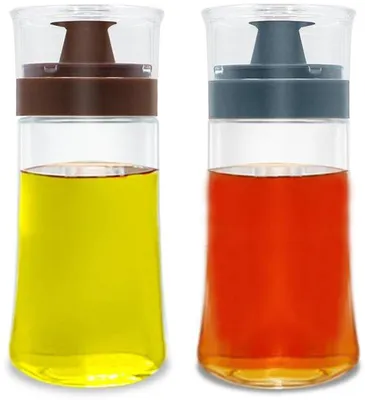 Immagine prodotto di Set da esterno con due flaconi di olio e dosatori in silicone