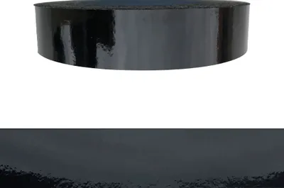 A roll of black, high-gloss edge banding tape.