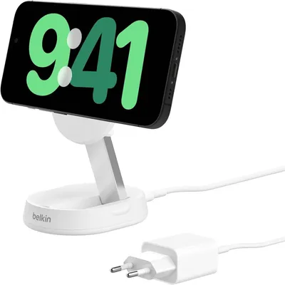 A white Belkin wireless mobile charger stand with a black smartphone displaying the time '9:41' is shown, connected to a white power adapter and cable.