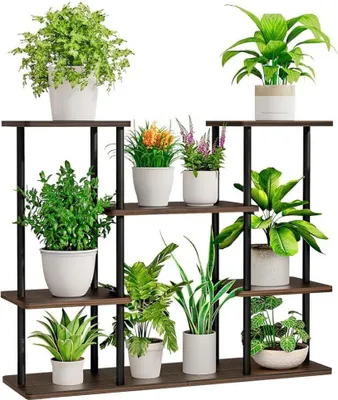 A multi-tiered plant stand filled with various potted plants.