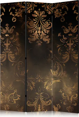 A three-panel room divider with a baroque ornament pattern in gold and bronze on a dark background.