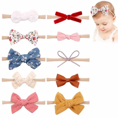 Immagine prodotto di 10 elastici per capelli per bambine, in nylon con fiocco