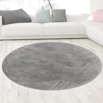Immagine prodotto di Tappeto antracite in pelliccia di coniglio dall'aspetto elegante e morbido, con raffinato luccichio, dimensioni moderne - 120 cm rotondo