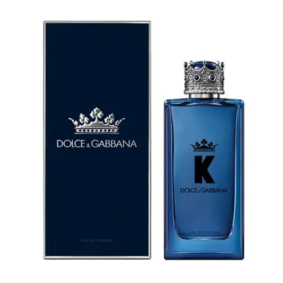 A bottle of Dolce & Gabbana K Eau de Parfum and its matching box are displayed against a white background.