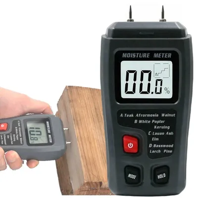 Zdjęcie produktu dla MIERNIK WILGOTNOŚCI DREWNA wilgotnościomierz do drewna z LCD HOLD 9V precyzyjny tester wilgoci opału i desek