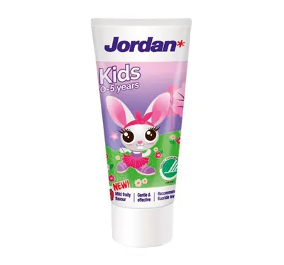 A tube of Jordan Kids toothpaste with a cartoon bunny illustration.