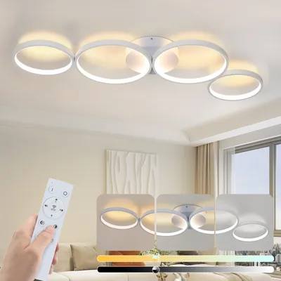 A hand holding a remote control in front of a modern ceiling light fixture with multiple rings, with smaller inset images showing different lighting effects.