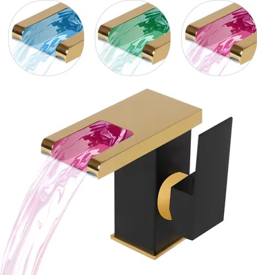 A modern faucet with gold and black accents, showing water flowing in pink, blue, and green colors.