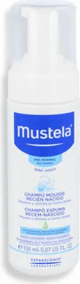 A white bottle of Mustela baby shampoo with a blue label.