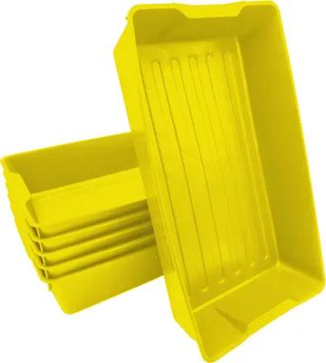 A stack of yellow plastic planting trays.