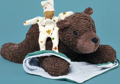 Produktbild von Käthe Kruse Stofftier BENJI liegend, Baumwollfrottee, 12 cm breit, weiche Pfoten