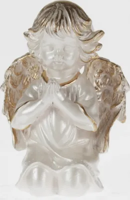 A white and gold angel figurine praying.