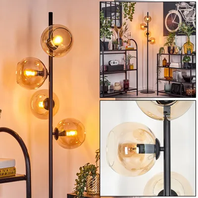 Produktbild von Cesaro Stehlampe aus Metall/Glas in Schwarz/Bernsteinfarben mit Fußschalter