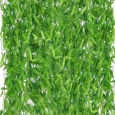 Immagine prodotto di Ghirlanda di foglie artificiali verdi da 1,79 m per decorazioni di casa e giardino