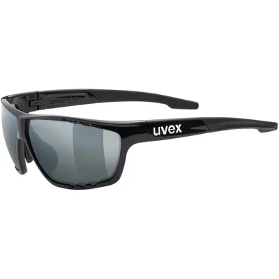 A pair of black sports sunglasses with gray lenses, shown from a side-diagonal angle against a white background.