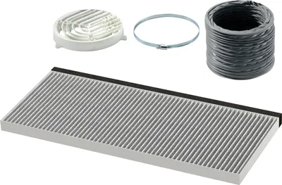 A set of parts for a kitchen appliance, including a filter, a clamp, and a flexible tube.