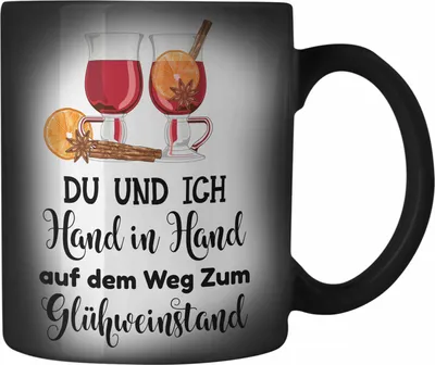 Produktbild von Trendation - Glühwein Farbwechsel Zauber-Tasse Lustig Spruch Glühweinbecher mit Henkel Doppelwandig GlühweinFarbwechsel Zauber-Tassen Gläser Weihnachtsmarkt Becher Farbwechsel Zauber-Tassen Geschenk - Hand In Hand Zum Glühweinstand (Schwarz)