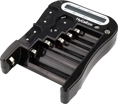 A black digital battery tester with multiple battery slots and a small LCD screen.