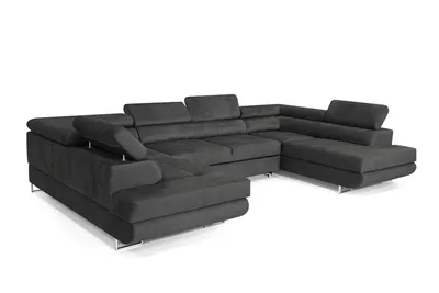 A dark gray sectional sofa is shown against a white background.