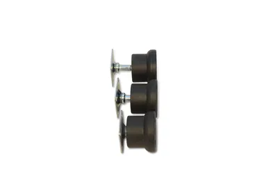 Three black furniture glides with silver screws are arranged vertically against a white background.