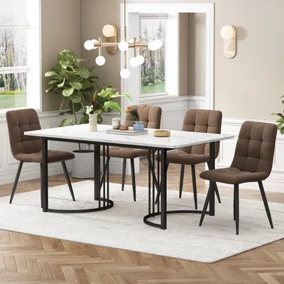 A dining set with a marble-top table and four chairs in a well-lit room.