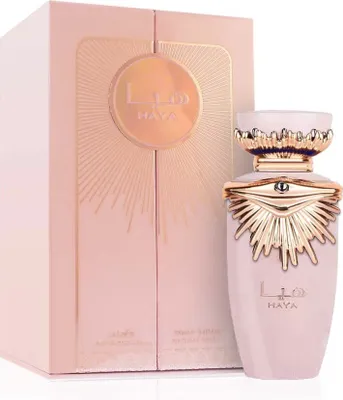 A perfume bottle and its box are displayed against a white background.