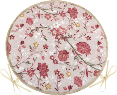 A round seat cushion with a floral pattern.