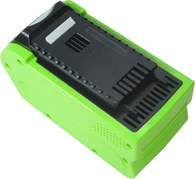 A green and black battery pack for power tools, shown from a top-down diagonal angle against a white background.