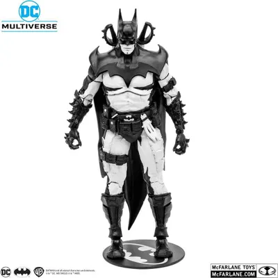 A black and white action figure of Batman standing on a display base.