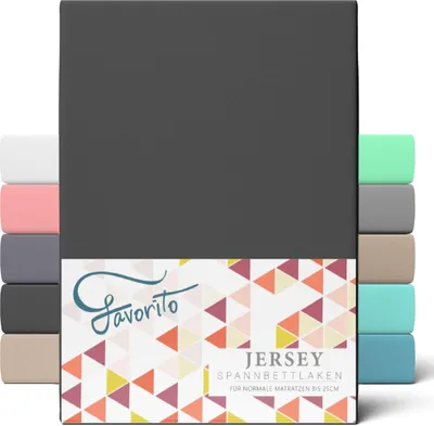 A product image showing a folded dark gray jersey fitted sheet with multiple other colored fitted sheets stacked to the left and right, and a patterned label at the bottom.