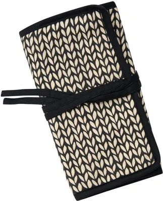 A closed knitting needle case with a leaf pattern and black ties.