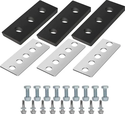 A set of black and silver metal plates and bolts, likely for machinery or construction.