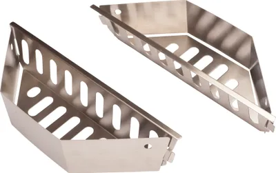 Two stainless steel grill briquette holders shown from a diagonal angle against a white background.