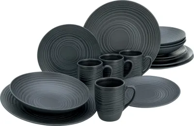 A collection of dark gray stoneware plates and mugs arranged on a white background.
