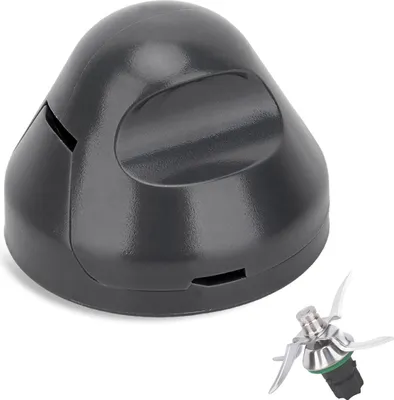 A dark gray dough protector and a silver blade attachment are shown against a white background.