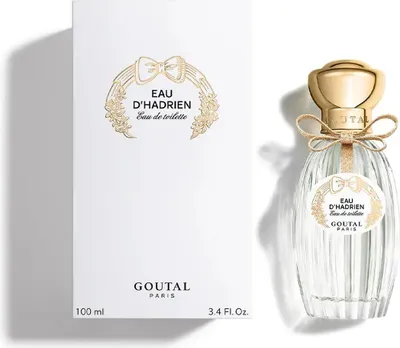 A perfume bottle and its packaging are displayed side-by-side on a white background.