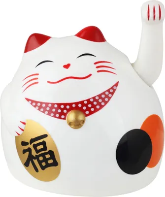 A white Maneki Neko cat figurine with red ears and collar, holding a gold oval with Japanese characters.