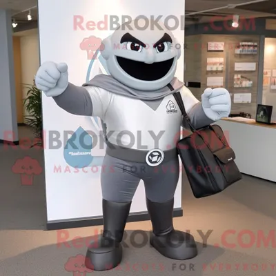 Immagine prodotto di Personaggio mascotte REDBROKOLY di un supereroe grigio vestito con camicia di popeline e valigetta