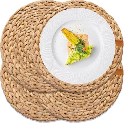 Produktbild von Unyqoos® Runde handgewebte Platzsets aus Wasserhyazinthe – 4er-Set Ø 33 cm, rutschfest, hitzebeständig, natürliche Tischuntersetzer