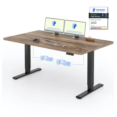 A modern standing desk with two monitors and a keyboard on it.